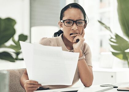 Woman reviewing papers