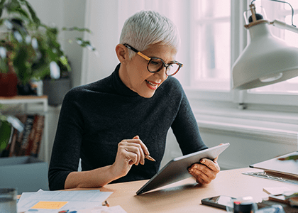 Woman working on tablet